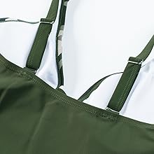 Shoulder straps and buckle at back are adjustable